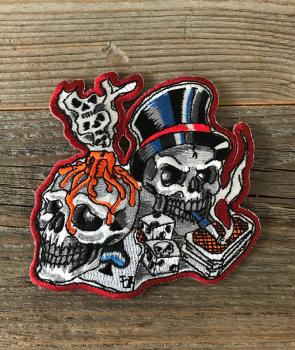 Totenkopf mit Kerze und Zilinder